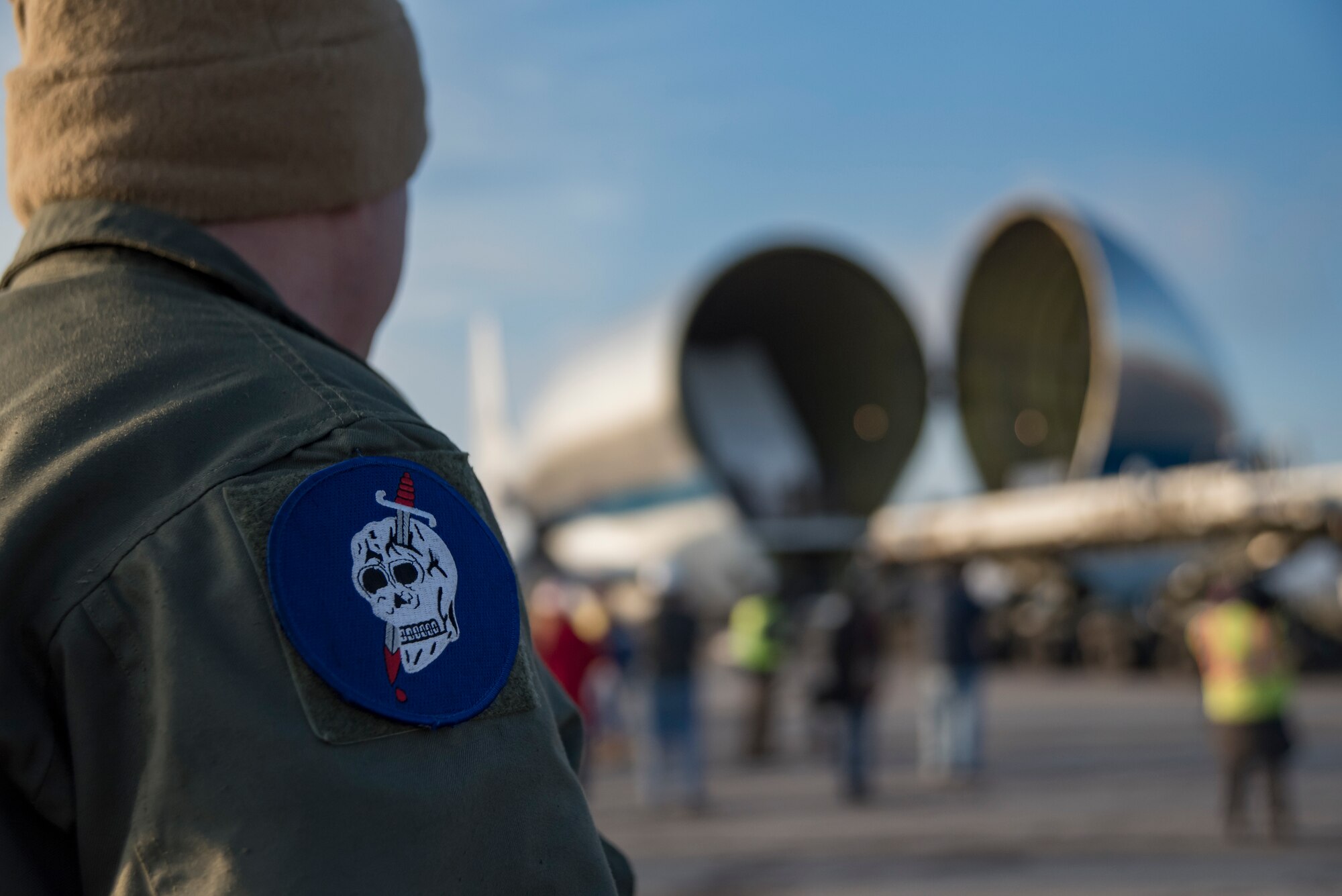 Photo of a 179th Airlift Wing member standing in front of the NASA Super Guppy