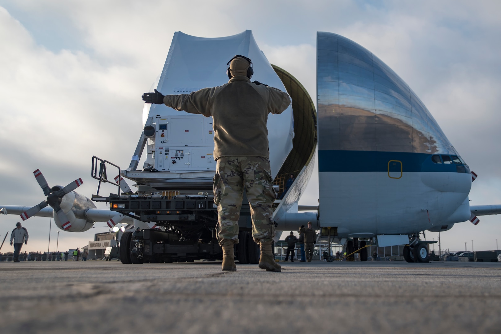 The NASA Super Guppy unloads the Orion space capsule using a 60k loader with assistance from the 179th Airlift Wing, Mansfield, Ohio, Nov. 24, 2019.