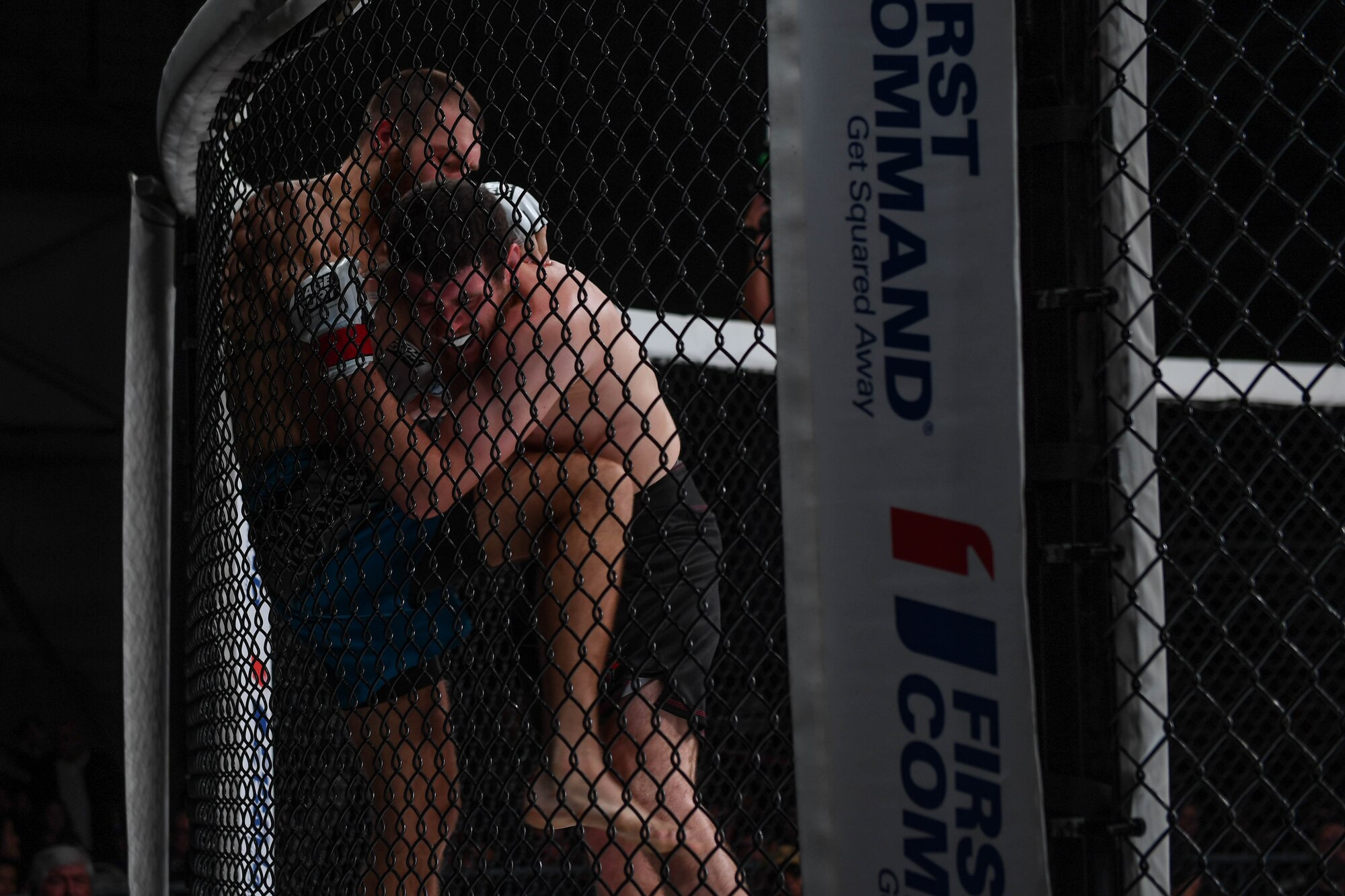 Dakota Dyer, Cage Fury Fighting Championship fighter, knees Matt Thompson during the CFFC 80 at Joint Base Langley-Eustis, Virginia, Nov. 22, 2019.
