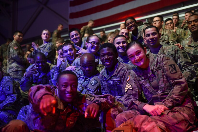 U.S. Army advanced individual training Soldiers pose for a photos during the Cage Fury Fighting Champion 80 “Fight for Troops” event at Joint Base Langley-Eustis, Virginia, Nov. 22, 2019.
