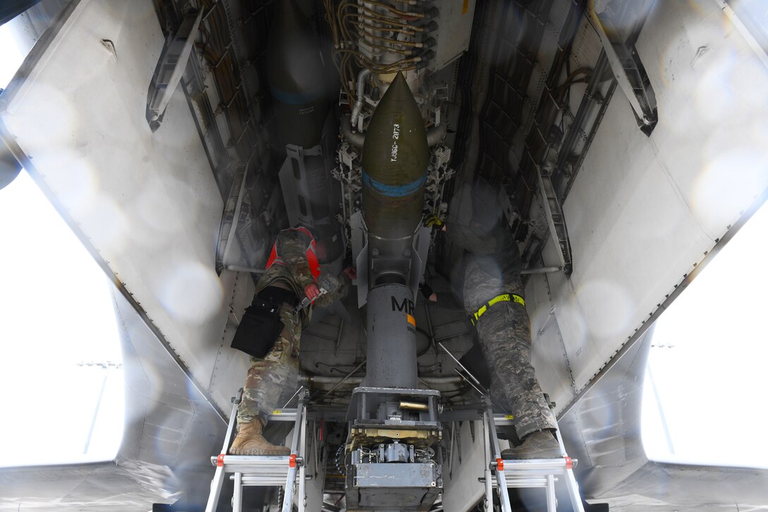 Airmen assigned to the 28th Maintenance Group load munitions into a B-1B Lancer for routine training at Ellsworth Air Force Base, S.D., Oct. 23, 2019. The 28th MXG recently won the Ellis Giant Sword (recognizing the best bomber maintenance) and best conventional aircraft crew chief team awards at the 2019 Global Strike Challenge. (U.S. Air Force photo by Senior Airman Nicolas Z. Erwin)