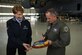 Air Force Chief of Staff Gen. David L. Goldfein and Secretary of the Air Force Barbara Barrett sign a plaque for the 721st Maintenance Squadron during a tour of Ramstein Air Base, Germany, Nov. 22, 2019.