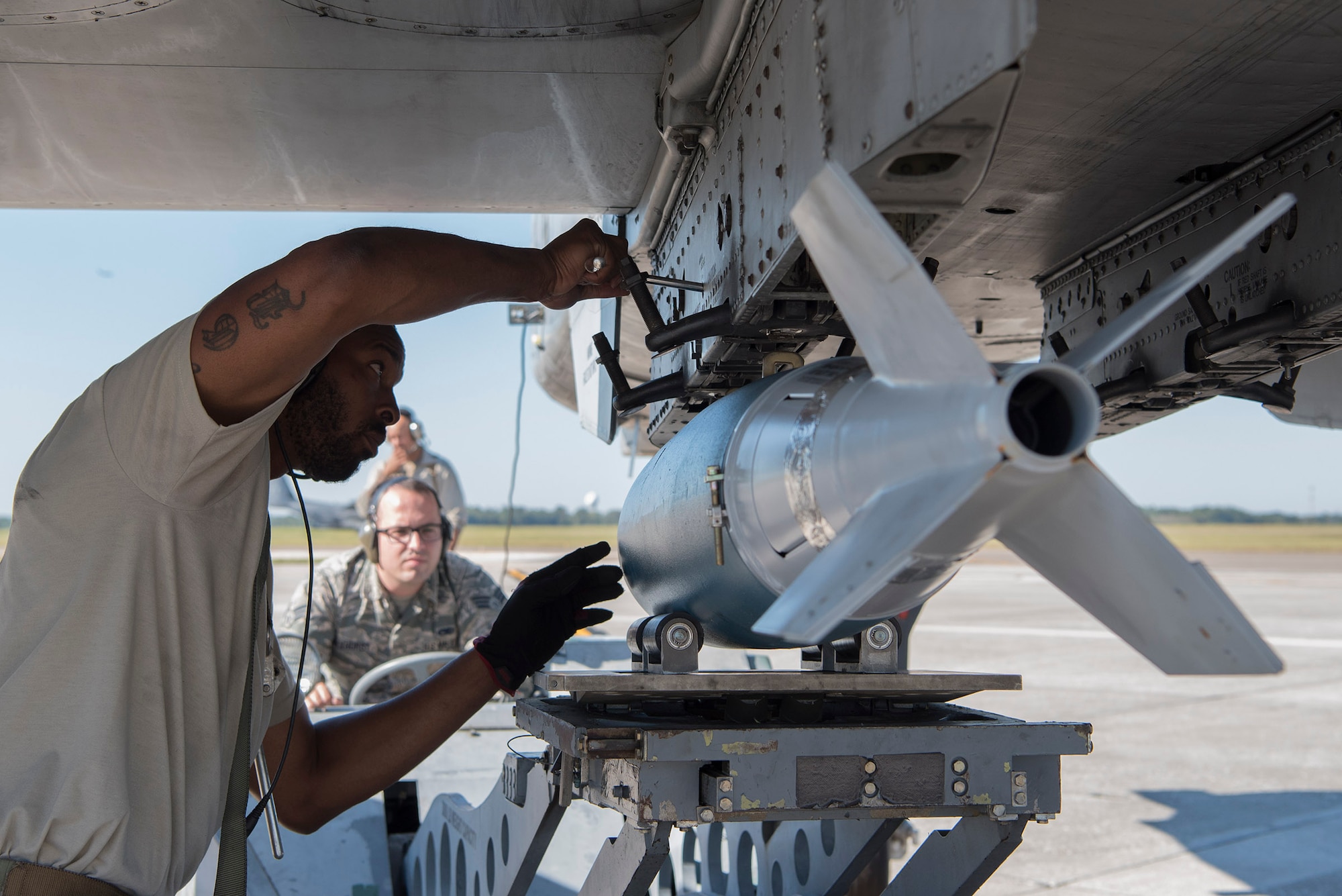 Airmen assigned to the 23rd Aircraft Maintenance Squadron, Moody Air Force Base, Ga., load munitions on an A-10 Thunderbolt II aircraft assigned to the 74th Fighter Squadron Moody AFB during exercise Mobil Tiger on MacDill Air Force Base, Fla., Nov. 20, 2019.