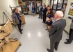 Photo of Dr. Portia Crowe, Chief Data Officer Army Futures Command's Network Cross-Functional Team and Lt. Col. Brandon Baer, Product Manager for Helicopter and Multi-Mission Radios, Project Manager Tactical Radios touring Tobyhanna Army Depot.