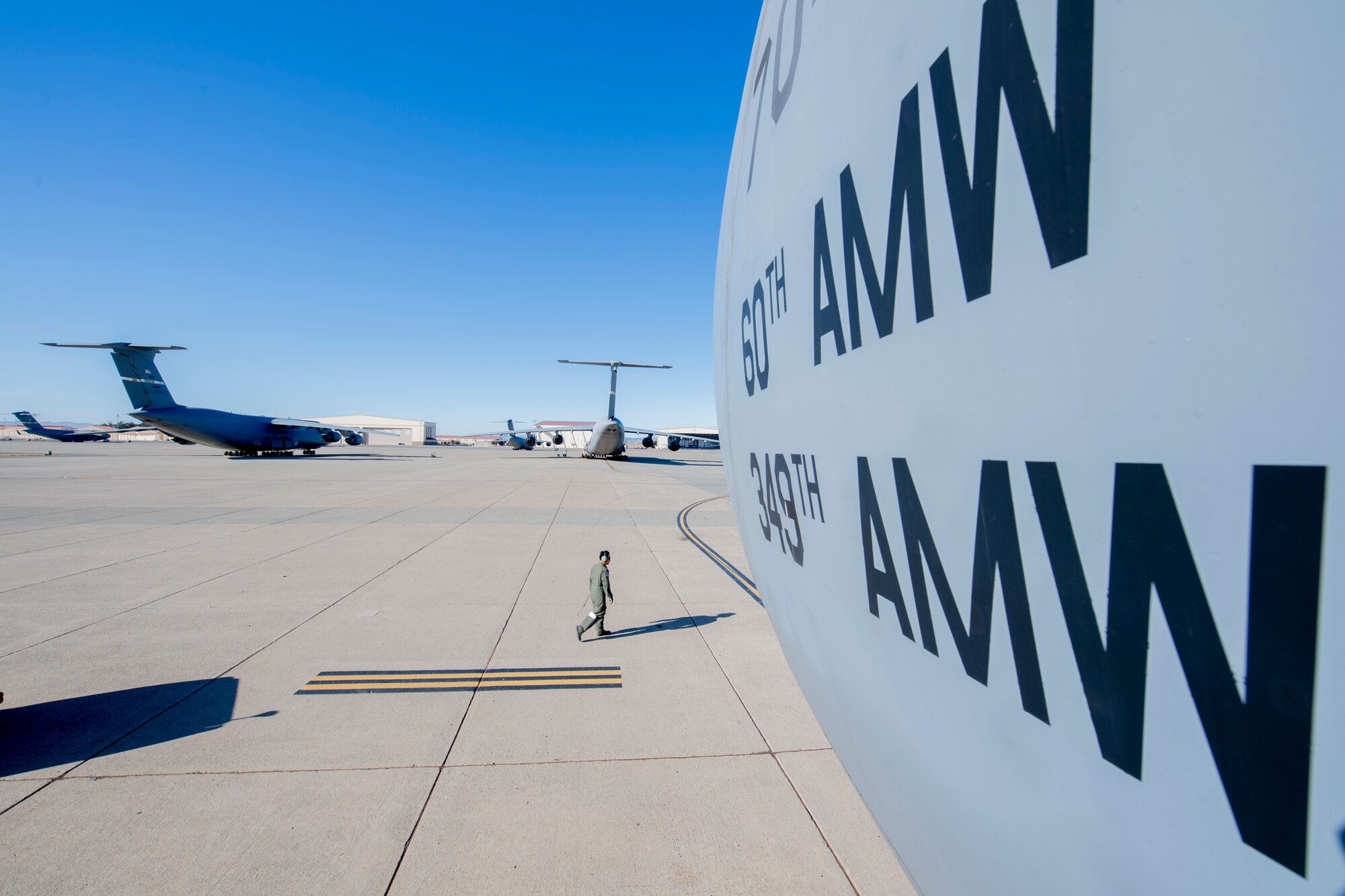 Photos of the 22nd Airlift Squadron preparing for flight.