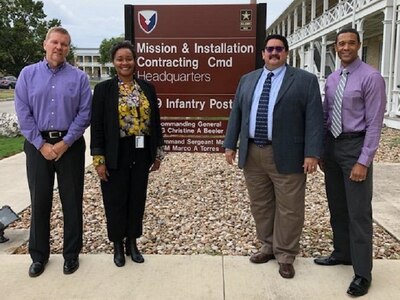 (From left) Pat Hogston, Monica Chisolm, Raul Guerra and Wiley Cox were part of a Mission and Installation Contracting Command integrated process team earning recognition as the 2019 Secretary of the Army award winner for excellence in contracting in the innovation in contracting category.