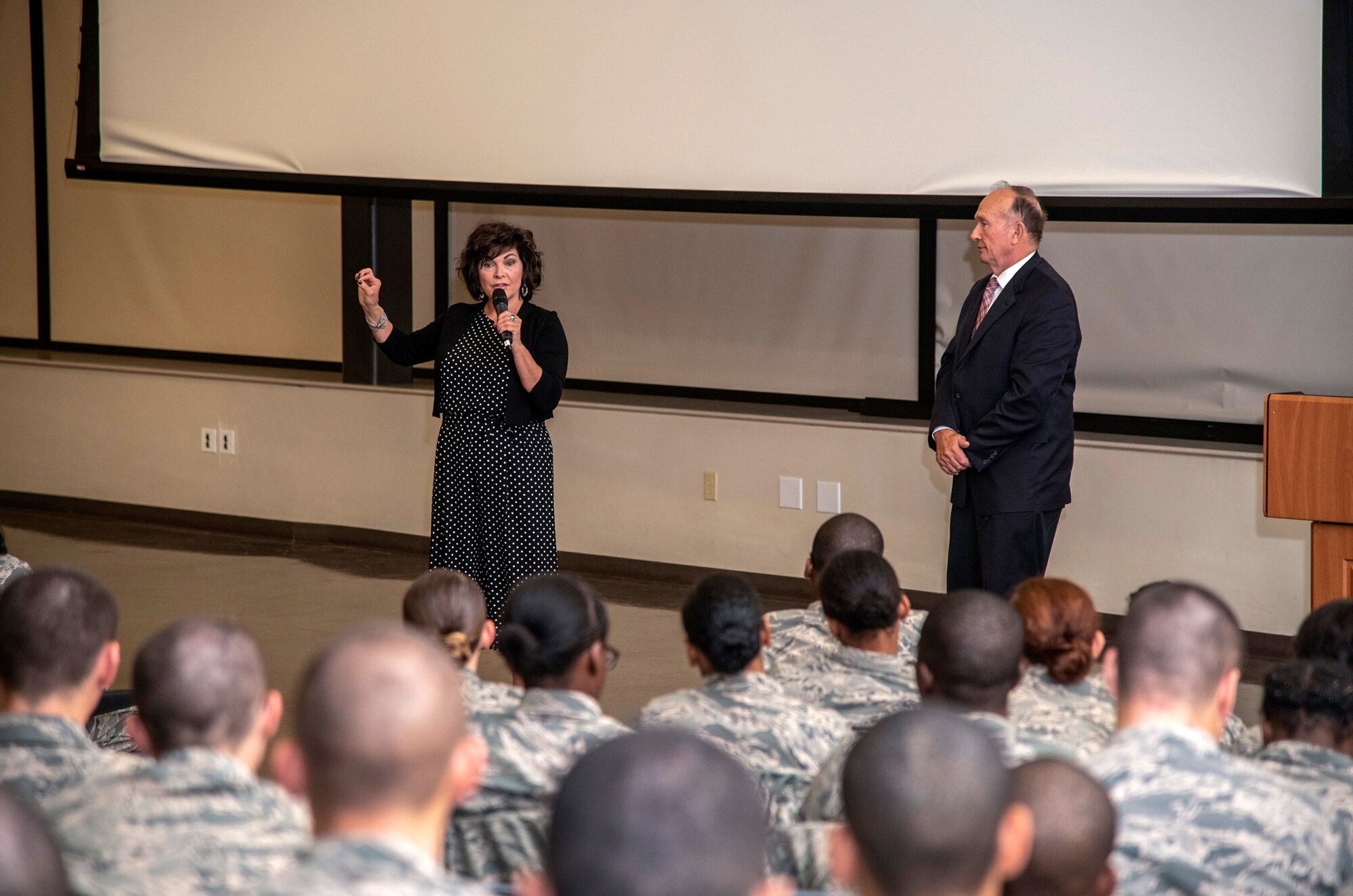 Retired Capt. Guy Gruters, a former F-100 Super Sabre pilot and prisoner of war, and Jeanine Sijan, Air Force Capt. Lance Sijan's sister, answered questions from the audience consisting of Airmen and Air Force civilians during the showing of a documentary film of Sijan's captivity called “SIJAN: A Quest for Freedom” Nov. 7, 2019, at Joint Base San Antonio-Lackland, Texas. Capt. Sijan is the only Congressional Medal of Honor recipient alumni of the U.S. Air Force Academy was forced to eject from his fighter jet over Laos. He was on his 52nd combat mission. He faced severe injuries, including several broken bones. But for 46 days, he managed to evade enemies with little food or water. Sijan was eventually captured and tortured as a Prisoner of War. He attempted to escape several times but was recaptured and beaten. The last person who saw him alive was Air Force Captain Guy Gruters.
