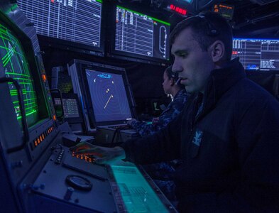 IMAGE: ATLANTIC OCEAN -- Air Traffic Controller 3rd Class Brandan Cloud, foreground, and Air Traffic Controller 1st Class Laura Garcia track air traffic in the vicinity of the aircraft carrier USS Harry S. Truman (CVN 75). More than 150 technical experts from Naval Surface Warfare Center (NSWC) Dahlgren Division, NSWC Philadelphia Division, and NSWC Indian Head Explosive Ordnance Disposal Technology Division attended a Nov. 8, 2019 event -- called Dahlgren Innovation Day, for discussions and demonstrations about technologies that will impact the current and future fleet, including the Truman and its battle group. "We saw demonstrations that involved artificial intelligence, machine learning, sensors, quantum-based computing, cloud-native technologies, automation, blockchain, and other advanced capabilities that will have a dramatic impact on our development of innovative solutions for the fleet," said Laura Martin, program manager for the Information Technology Hyper Convergence - Hybrid Cloud Team at NSWC Dahlgren Division.  (U.S. Navy photo by Mass Communication Specialist Seaman Emily M. Blair)