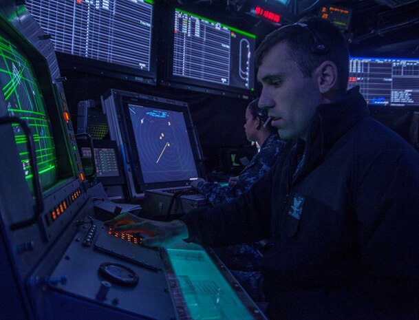 IMAGE: ATLANTIC OCEAN -- Air Traffic Controller 3rd Class Brandan Cloud, foreground, and Air Traffic Controller 1st Class Laura Garcia track air traffic in the vicinity of the aircraft carrier USS Harry S. Truman (CVN 75). More than 150 technical experts from Naval Surface Warfare Center (NSWC) Dahlgren Division, NSWC Philadelphia Division, and NSWC Indian Head Explosive Ordnance Disposal Technology Division attended a Nov. 8, 2019 event -- called Dahlgren Innovation Day, for discussions and demonstrations about technologies that will impact the current and future fleet, including the Truman and its battle group. "We saw demonstrations that involved artificial intelligence, machine learning, sensors, quantum-based computing, cloud-native technologies, automation, blockchain, and other advanced capabilities that will have a dramatic impact on our development of innovative solutions for the fleet," said Laura Martin, program manager for the Information Technology Hyper Convergence - Hybrid Cloud Team at NSWC Dahlgren Division.  (U.S. Navy photo by Mass Communication Specialist Seaman Emily M. Blair)