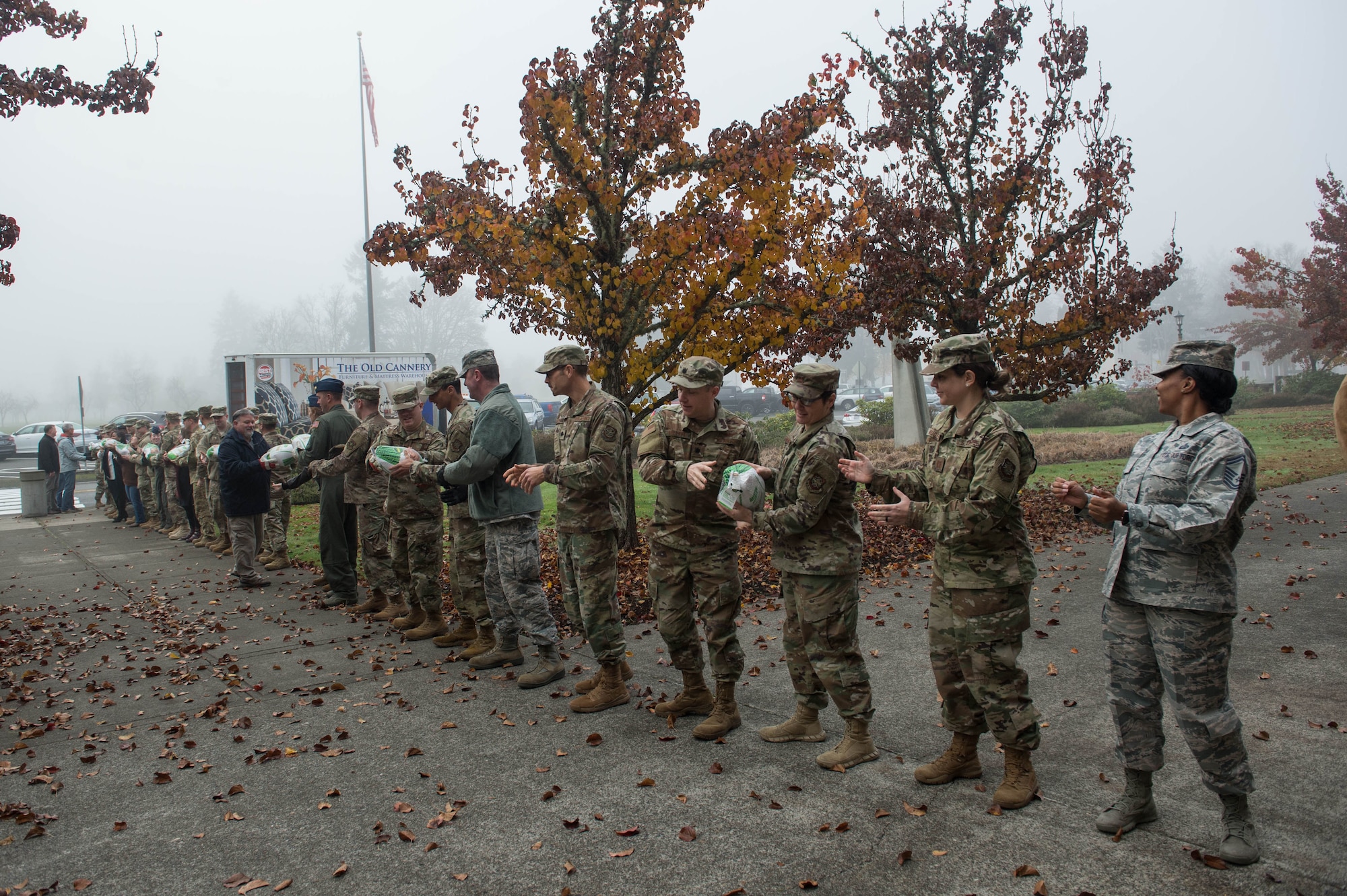 62nd Airlift Wing Airmen unload turkeys during Operation Turkey Drop, Nov. 21, 2019 at Joint Base Lewis-McChord, Wash. Local businesses donated over 250 turkeys to Team McChord Airmen this year.