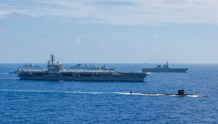 PHILIPPINE SEA (June 15, 2018) Ships from the Indian Navy, Japan Maritime Self-Defense Force (JMSDF) and the U.S. Navy sail in formation during Malabar 2018. Malabar 2018 is the 22nd rendition of the exercise and the first time it has been hosted off the coast of Guam. Malabar is designed to advance military-to-military coordination in a multinational environment between the U.S., Japan and Indian maritime forces. (U.S. Navy photo by Mass Communication Specialist 3rd Class Erwin Jacob V. Miciano)