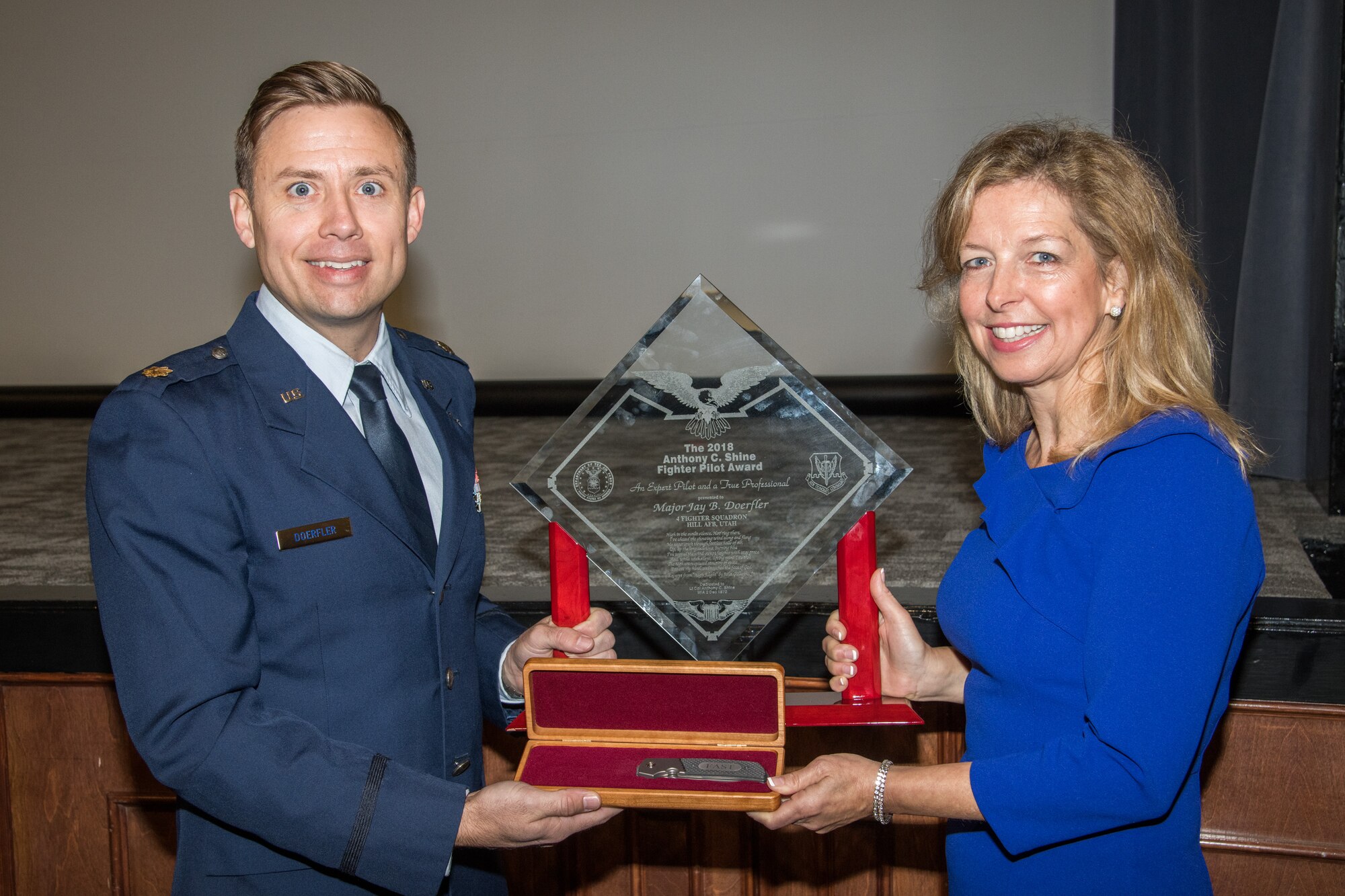 Major Jay Burrell Doerfler addressed the participants to his award ceremony at Maxwell AFB’s Wood Auditorium, Nov. 18, 2019. "[Maj. Doerfler] is a sterling example of the caliber of excellence my father stood for: courage, integrity, excellence, and service,” said Shine. “May you continue to demonstrate these qualities in all that you do.”