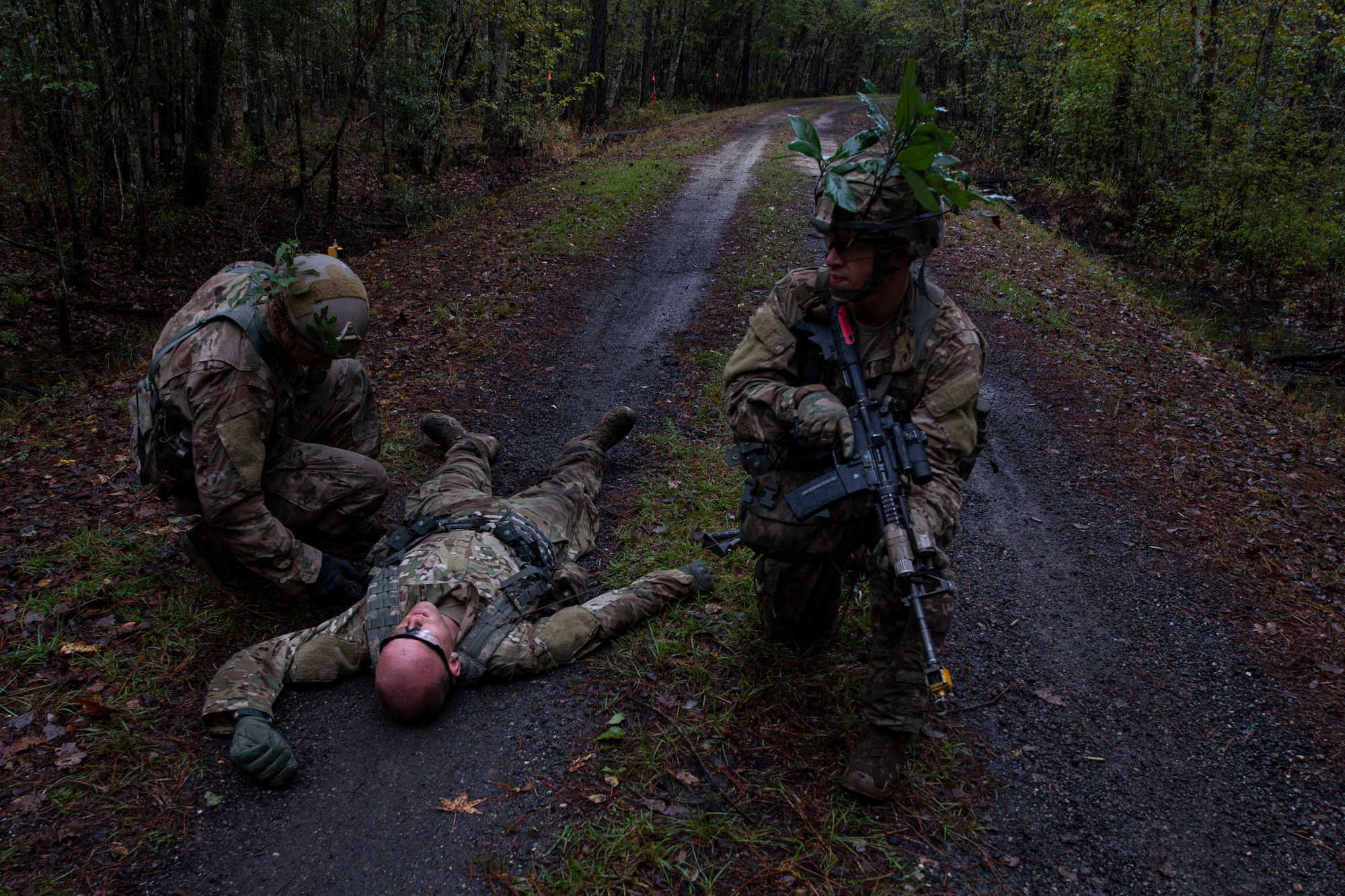 Students of the Air Force Ranger Assessment Course perform a simulated casualty search Nov. 15, 2019, at Moody Air Force Base, Ga. The course teaches students critical tasks such as land navigation, troop movements and shooting and maintaining weapons. Over the course of 19 days, the Ranger Assessment Course evaluates students to determine if they possess the knowledge, willpower and skill to attend Army Ranger School. (U.S. Air Force photo by Airman Azaria E. Foste
