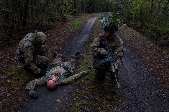 Students of the Air Force Ranger Assessment Course perform a simulated casualty search Nov. 15, 2019, at Moody Air Force Base, Ga. The course teaches students critical tasks such as land navigation, troop movements and shooting and maintaining weapons. Over the course of 19 days, the Ranger Assessment Course evaluates students to determine if they possess the knowledge, willpower and skill to attend Army Ranger School. (U.S. Air Force photo by Airman Azaria E. Foste