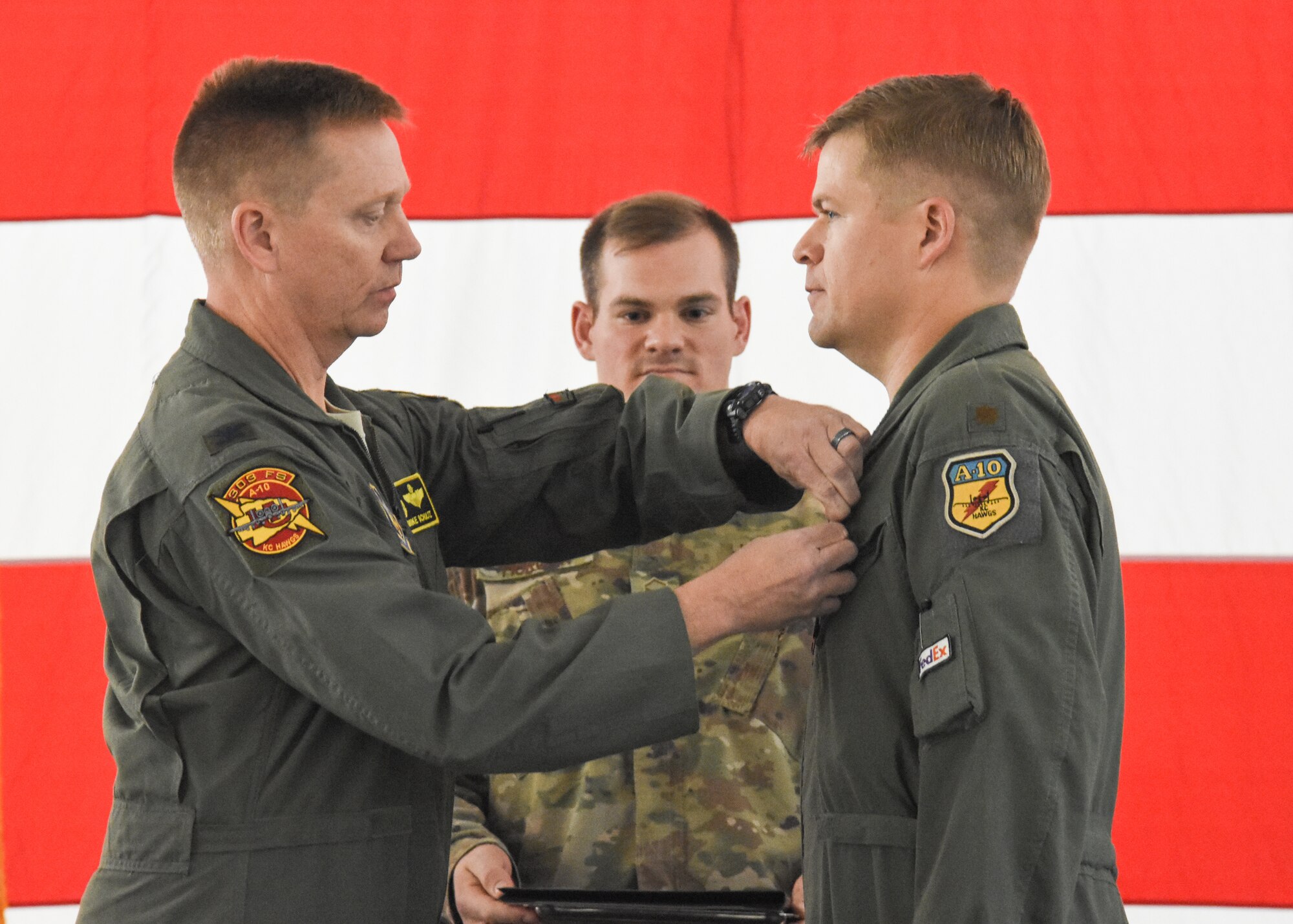 Col. Mike Schultz, commander of the 442d Fighter Wing, pins the Distinguished Flying Cross on Maj. John Tice, a flight commander with the 303d Fighter Squadron, during a ceremony at Whiteman Air Force Base, Mo., Nov. 2, 2019. Tice, a prior-enlisted Army combat engineer, earned the DFC during a combat mission flown in Afghanistan that resulted in 32 enemy combatants killed in action.