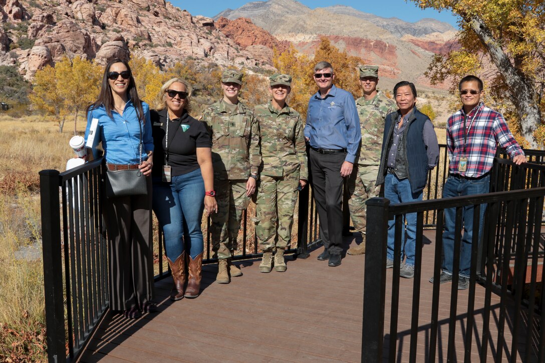 Leaders with the U.S. Army Corps of Engineers South Pacific Division, Los Angeles District and the Bureau of Land Management officially reopened Red Spring boardwalk Nov. 8. Roughly a half-mile in length ... the accessible boardwalk is in the Calico Basin of the Red Rock Canyon National Conservation Area, Nev.

From left to right, Claudia Garcia, project manager with the LA District's Arizona-Nevada Area Office; Catrina Williams, field manager for the BLM's Red Rock/Sloan Field Office;  1st Lt. Kara Styers, aide-de-camp to the SPD commander;  Brig. Gen. Kim Colloton, SPD commander; Brian Christ, vice president S&B Christ Consulting, LLC, of Las Vegas; Col. Aaron Barta, District commander; Viet Tran, project engineer for the district’s Las Vegas Resident Office; and Raymond Tsui, civil engineer with BLM's Southern Nevada District Office.