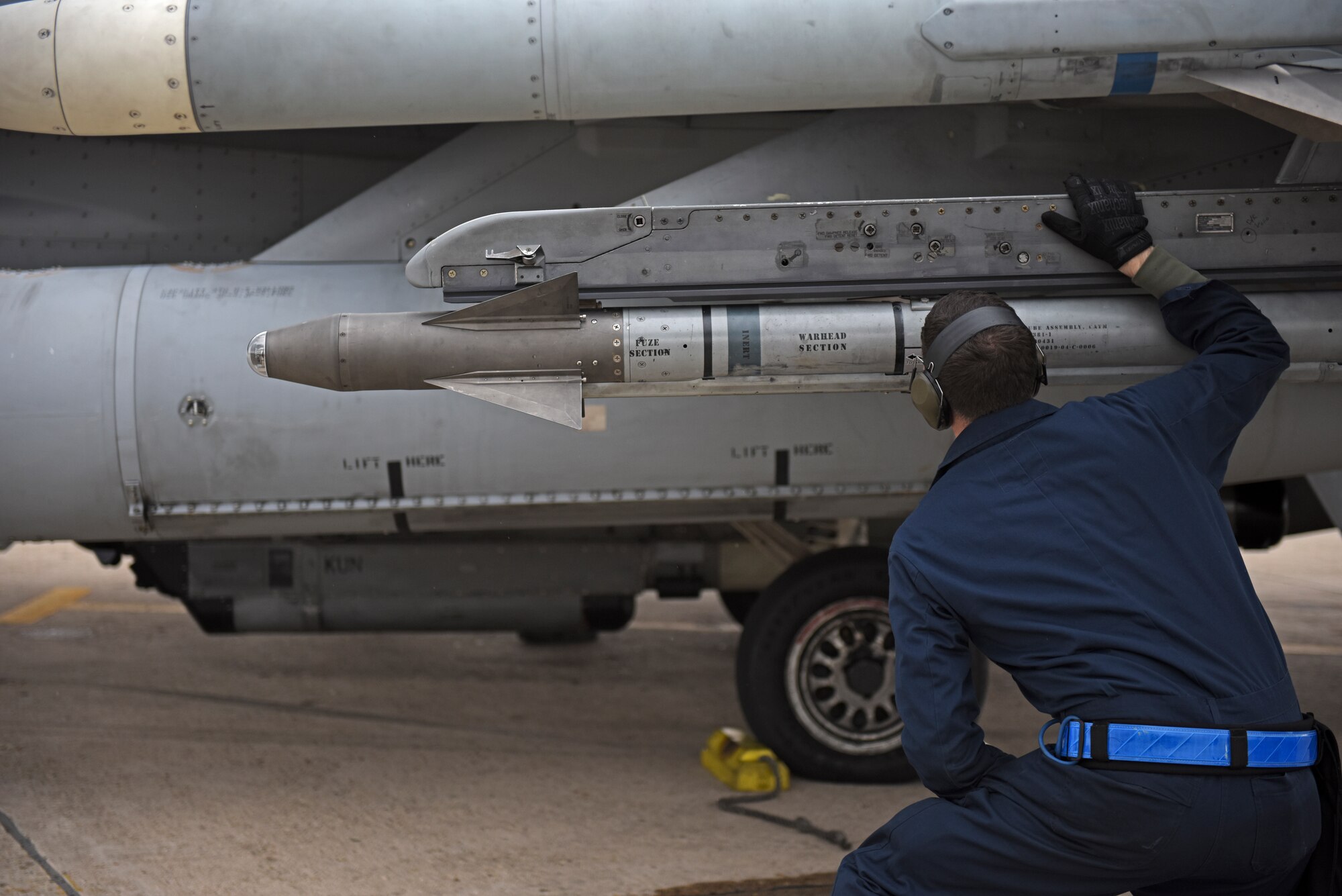 A U.S. Air Force maintainer assigned to the 35th Aircraft Maintenance Unit conducts a pre-flight inspection at Kunsan Air Base, Republic of Korea, Nov. 19, 2019. The 8th Maintenance Group provides on- and off-equipment maintenance on F-16 Fighting Falcons. The group also provides munitions, aircraft maintenance and maintenance operations support. (U.S. Air Force photo by Staff Sgt. Mackenzie Mendez)