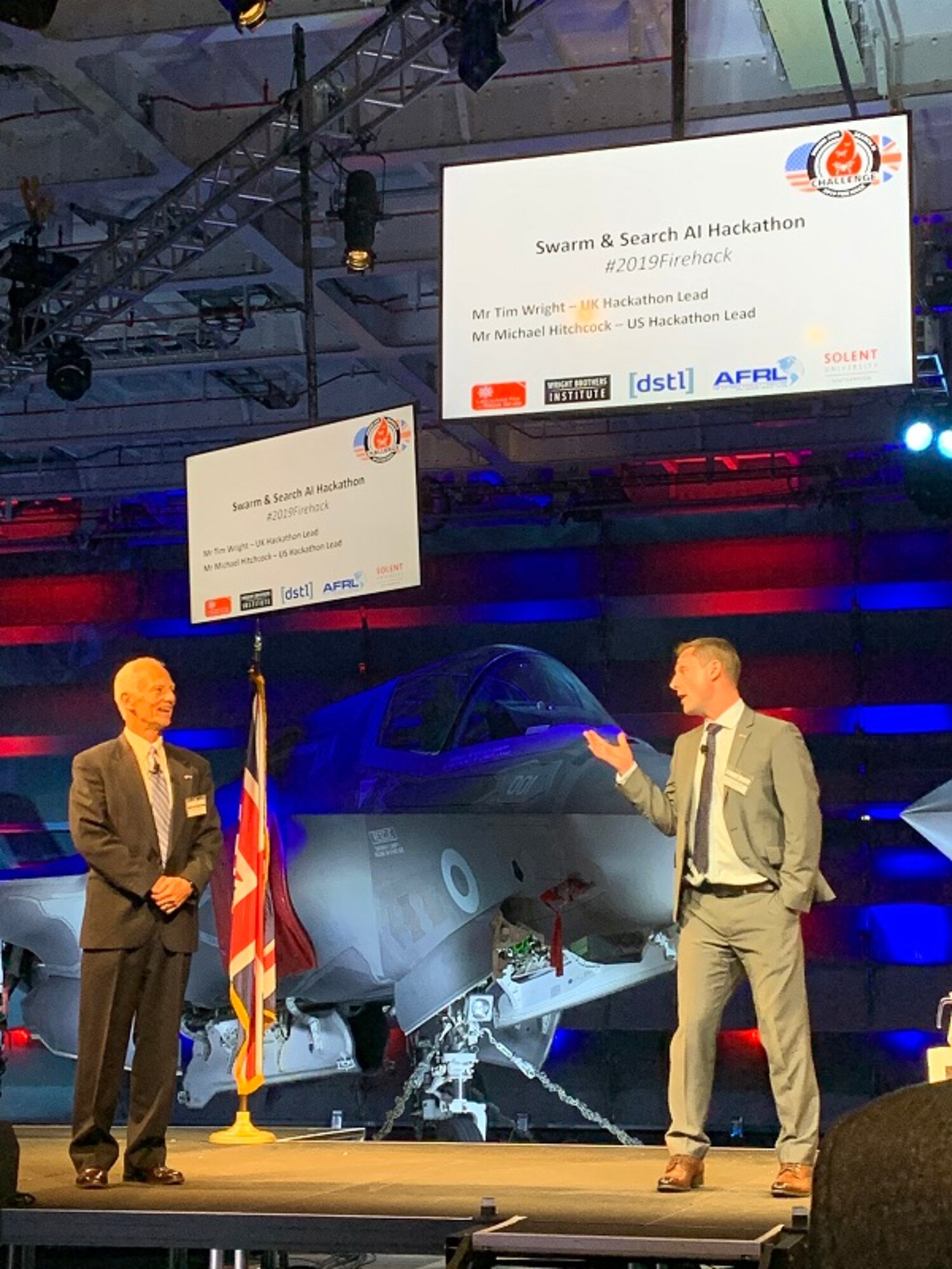Mick Hitchcock, AFRL Program Manager, left, and Timothy Wright, DSTL’s Aerospace Systems Group Leader, are both extremely pleased with the outcome of the Swarm and Search AI Challenge: 2019 Fire Hack and are looking forward to future collaboration opportunities. (Courtesy photo)