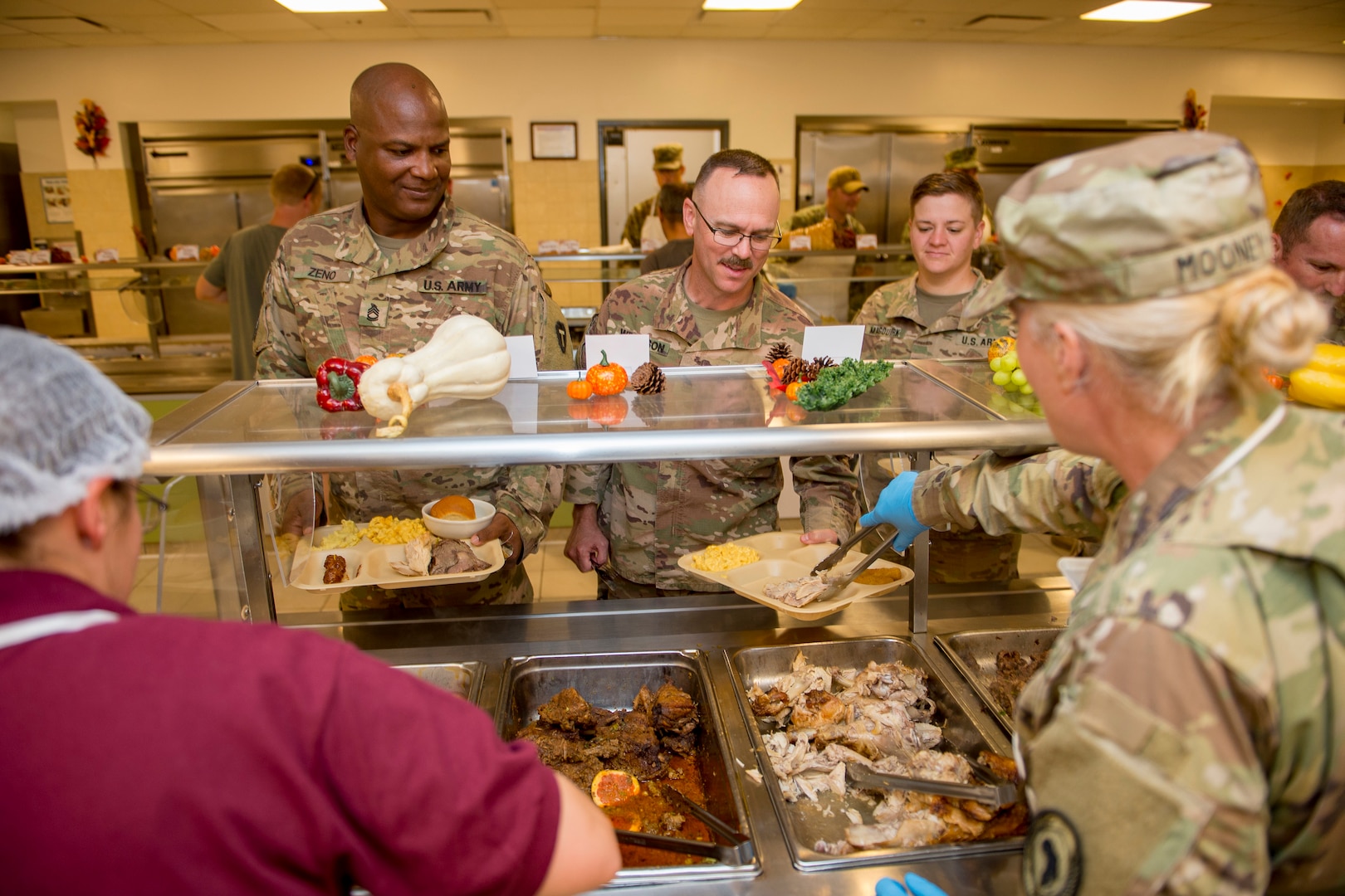 Service members receive their Thanksgiving meals
