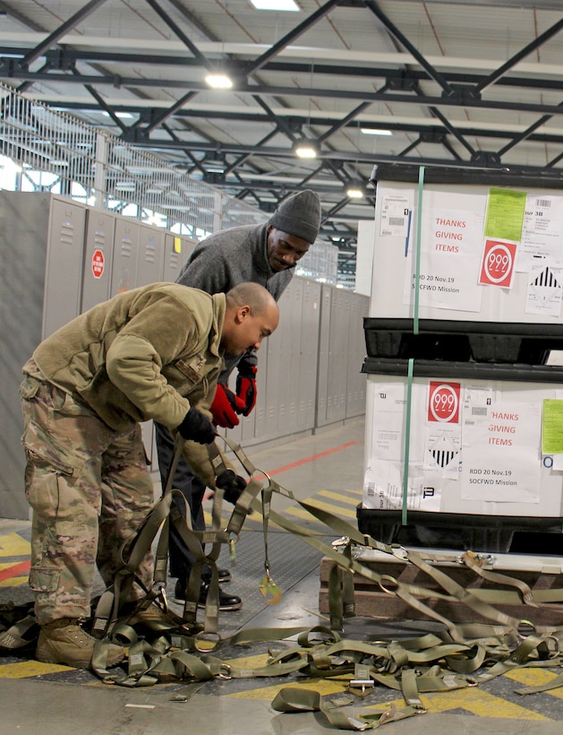 Food shipment pallets prepared for flight