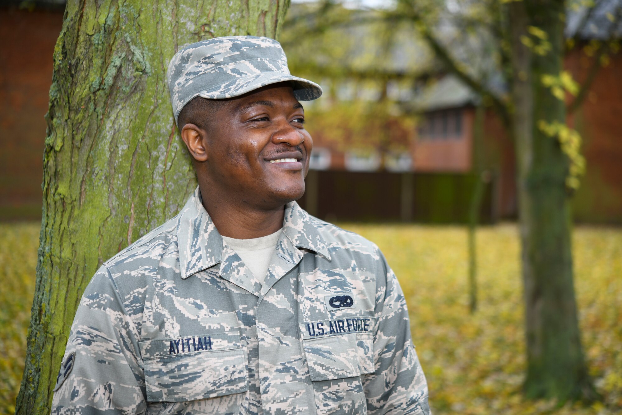 U.S. Air Force Airman 1st Class Micheal Ayitiah, 100th Maintenance Squadron crew chief, poses for a photo at RAF Mildenhall, England, Nov. 26, 2019. Ayitiah was 24 when he emigrated to where he thought he could achieve his dream– America. (U.S. Air Force photo by Senior Airman Alexandria Lee)