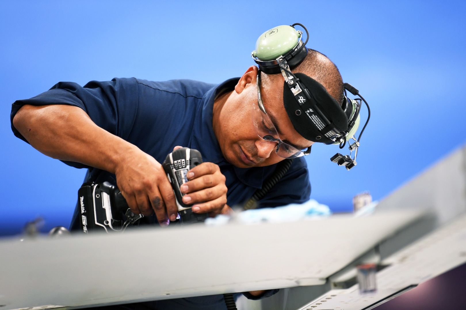 U.S. Air Force Tech. Sgt. Robert Guerrero, an F-16 fleet maintenance manager assigned to the 149th Maintenance Group, Texas Air National Guard, performs repairs and operations checks on an F-16 Fighting Falcon Nov. 21, 2019 at Joint Base San Antonio-Lackland, Texas. (Air National Guard photo by Mindy Bloem)