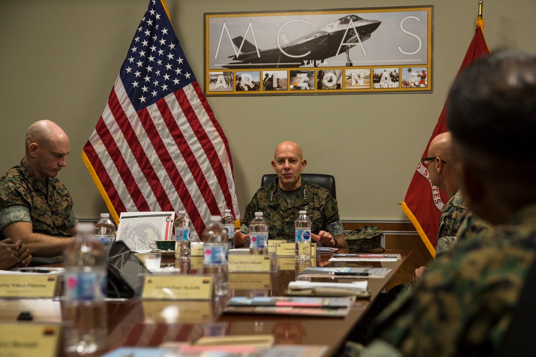 Gen. David H. Berger, the Commandant of the Marine Corps, and Sgt. Maj. Troy E. Black, the Sergeant Major of the Marine Corps, speak to Marines stationed on Marine Corps Air Station (MCAS) Yuma on the station parade deck Oct. 23, 2019. The purpose of the visit was to discuss upcoming changes in the Marine Corps with the Marines on the air station, address any of their questions, and get general feedback from the personnel. (U.S. Marine Corps photo by Sgt. Isaac D. Martinez)