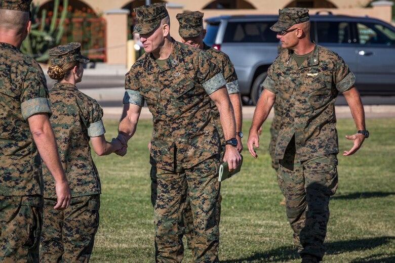 Gen. David H. Berger, the Commandant of the Marine Corps, and Sgt. Maj. Troy E. Black, the Sergeant Major of the Marine Corps, speak to Marines stationed on Marine Corps Air Station (MCAS) Yuma on the station parade deck Oct. 23, 2019. The purpose of the visit was to discuss upcoming changes in the Marine Corps with the Marines on the air station, address any of their questions, and get general feedback from the personnel. (U.S. Marine Corps photo by Sgt. Isaac D. Martinez)