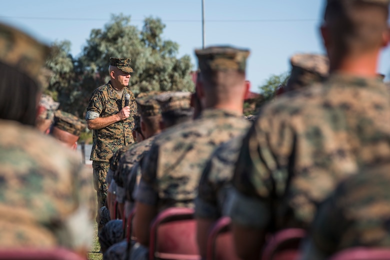 Gen. David H. Berger, the Commandant of the Marine Corps, and Sgt. Maj. Troy E. Black, the Sergeant Major of the Marine Corps, speak to Marines stationed on Marine Corps Air Station (MCAS) Yuma on the station parade deck Oct. 23, 2019. The purpose of the visit was to discuss upcoming changes in the Marine Corps with the Marines on the air station, address any of their questions, and get general feedback from the personnel. (U.S. Marine Corps photo by Sgt. Isaac D. Martinez)