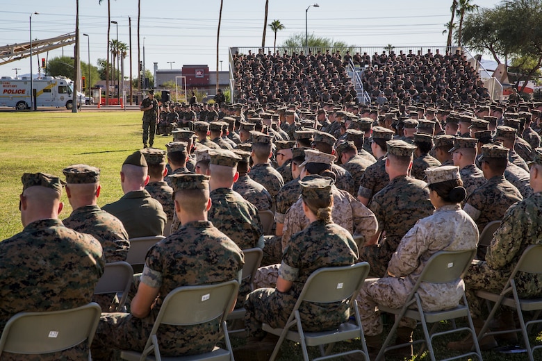 Gen. David H. Berger, the Commandant of the Marine Corps, and Sgt. Maj. Troy E. Black, the Sergeant Major of the Marine Corps, speak to Marines stationed on Marine Corps Air Station (MCAS) Yuma on the station parade deck Oct. 23, 2019. The purpose of the visit was to discuss upcoming changes in the Marine Corps with the Marines on the air station, address any of their questions, and get general feedback from the personnel. (U.S. Marine Corps photo by Sgt. Isaac D. Martinez)