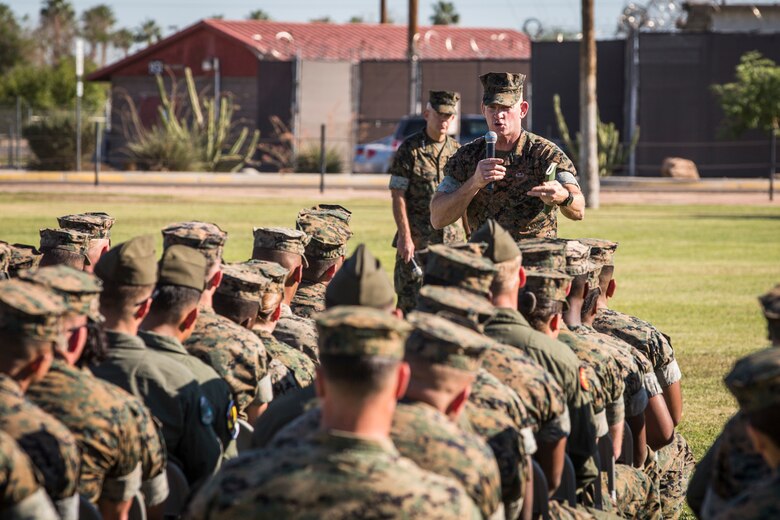 Gen. David H. Berger, the Commandant of the Marine Corps, and Sgt. Maj. Troy E. Black, the Sergeant Major of the Marine Corps, speak to Marines stationed on Marine Corps Air Station (MCAS) Yuma on the station parade deck Oct. 23, 2019. The purpose of the visit was to discuss upcoming changes in the Marine Corps with the Marines on the air station, address any of their questions, and get general feedback from the personnel. (U.S. Marine Corps photo by Sgt. Isaac D. Martinez)