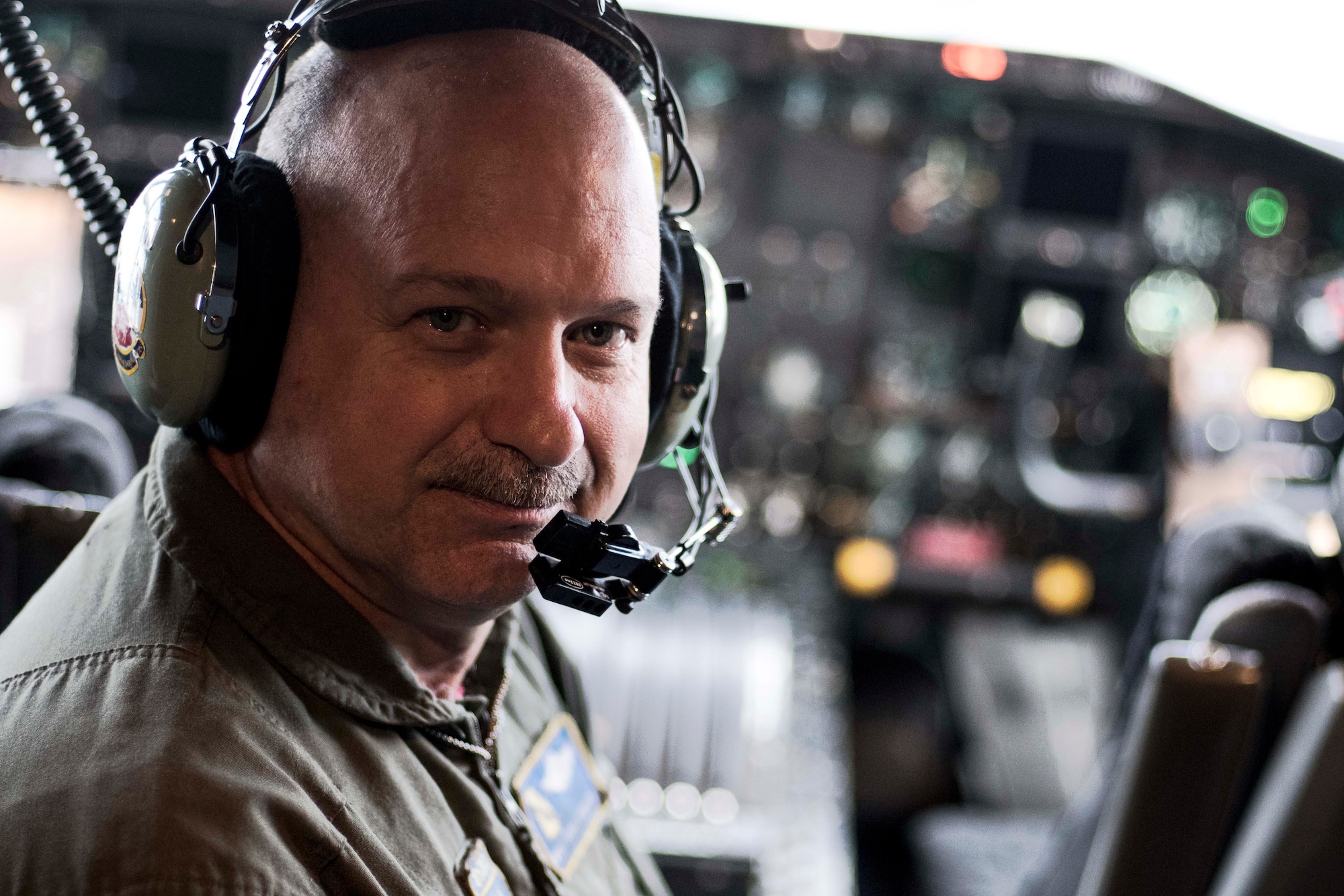 Chief Master Sgt. Terry Studstill, 700th Airlift Squadron flight engineer superintendent, poses for a photo in a C-130H3 Hercules at Dobbins Air Reserve Base, Ga. on Nov. 22, 2019. A couple days later, he reached 10,000 flight hours - a major accomplishment for aviators. (U.S. Air Force photo/Tech. Sgt. Andrew Park)
