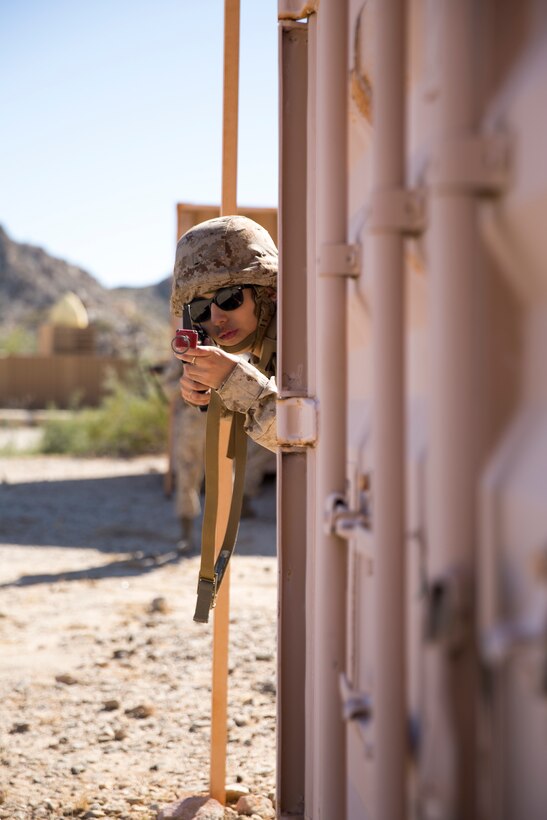 U.S. Marine Corps Lt.Col. James C. Paxton, the commanding officer of Marine Corps Air Station (MCAS) Yuma's Headquarters & Headquarters Squadron, leads non-commissioned officers (NCOs) in a hike during “Operation Backbone" in Yuma, Arizona, Oct. 25, 2019. Operation Backbone helps to strengthen the warrior spirit in NCOs and promote cohesion between the different units of MCAS Yuma. The exercise consisted of a five and a half mile hike, several classes, and closed with a warriors night dinner. Classes included simulated room clearing, a Search and Rescue (SAR) demonstration, and proper procedure when fitting a tourniquet. (U.S. Marine Corps photo by Cpl. Nicole Rogge)