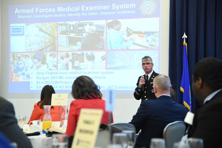 Col. Louis Finelli, Armed Forces Medical Examiner System director, speaks during the State of the Base on Dover Air Force Base, Del., Nov. 25, 2019. State of the Base is an annual event that provides community leaders an opportunity to learn more about Dover AFB’s operations and future plans. (U.S. Air Force photo by Senior Airman Eric M. Fisher)