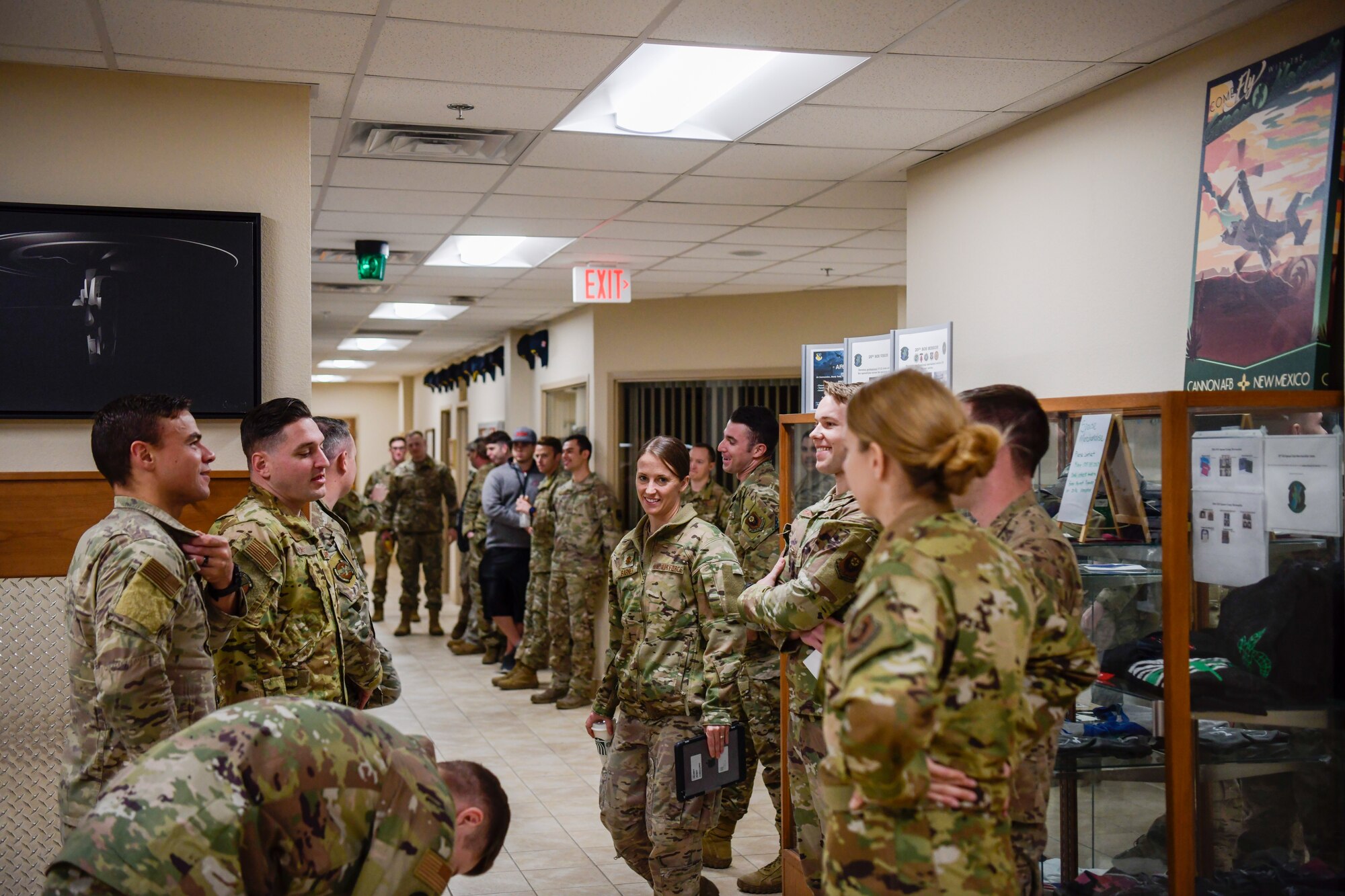 Members of the 20th Special Operations Squadron gather at their squadron building for a ceremony on Cannon Air Force Base, N.M., Nov. 26, 2019. The ceremony was held to honor a Medal of Honor recipient and Vietnam War veteran, Col. James Fleming of the 20th SOS. (U.S. Air Force photo by Senior Airman Marcel Williams)