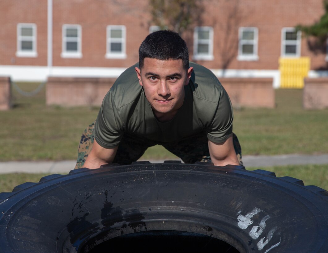 Pfc. John Acosta, an administrative specialist with Marine Wing Headquarters Squadron 2, 2nd Marine Aircraft Wing poses for a photo at Marine Corps Air Station Cherry Point, North Carolina. “Be the example. If your peers see you striving to better yourself, then they will follow in your footsteps.” said Acosta, a Houston, Texas, native. He was nominated for becoming a HITT instructor, running a 299 CFT and for showing initiative within his section. (U.S. Marine Corps photo by Lance Cpl. Steven M. Walls)