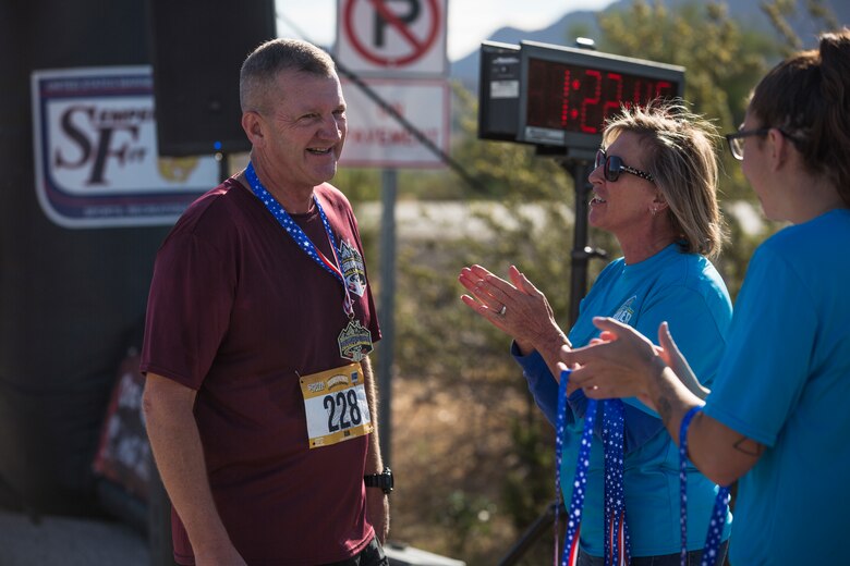 Competitors in the 2nd Annual Telegraph Pass Challenge prepare to start the 5 mile bike portion of the race in Yuma, Ariz., Nov. 2, 2019. The challenge, coordinated by Marine Corps Community Services (MCCS), offered participants the opportunity to compete for first, second, or third place in either a 5 mile run, 5 mile bike route, or both. (U.S. Marine Corps photo by Sgt. Isaac D. Martinez)