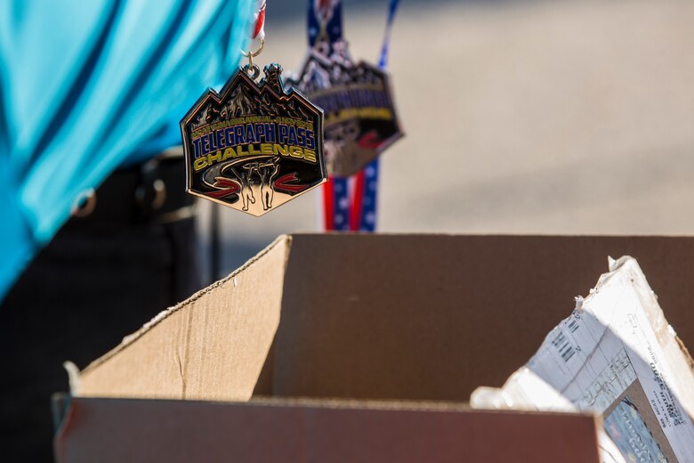 Competitors in the 2nd Annual Telegraph Pass Challenge prepare to start the 5 mile bike portion of the race in Yuma, Ariz., Nov. 2, 2019. The challenge, coordinated by Marine Corps Community Services (MCCS), offered participants the opportunity to compete for first, second, or third place in either a 5 mile run, 5 mile bike route, or both. (U.S. Marine Corps photo by Sgt. Isaac D. Martinez)