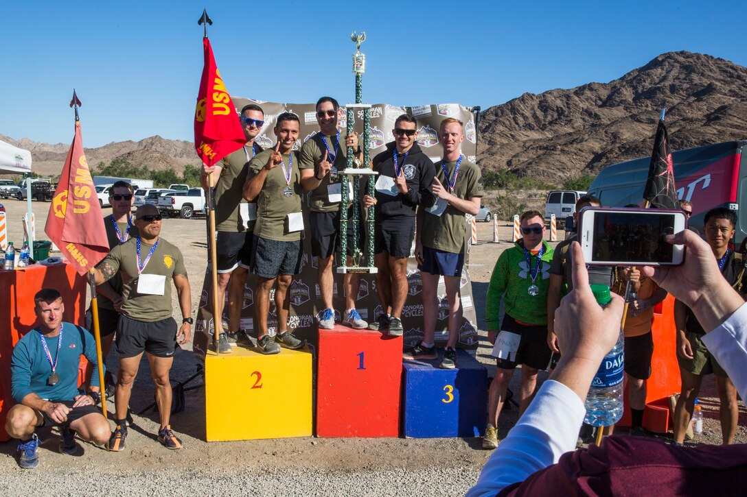 Competitors in the 2nd Annual Telegraph Pass Challenge prepare to start the 5 mile bike portion of the race in Yuma, Ariz., Nov. 2, 2019. The challenge, coordinated by Marine Corps Community Services (MCCS), offered participants the opportunity to compete for first, second, or third place in either a 5 mile run, 5 mile bike route, or both. (U.S. Marine Corps photo by Sgt. Isaac D. Martinez)