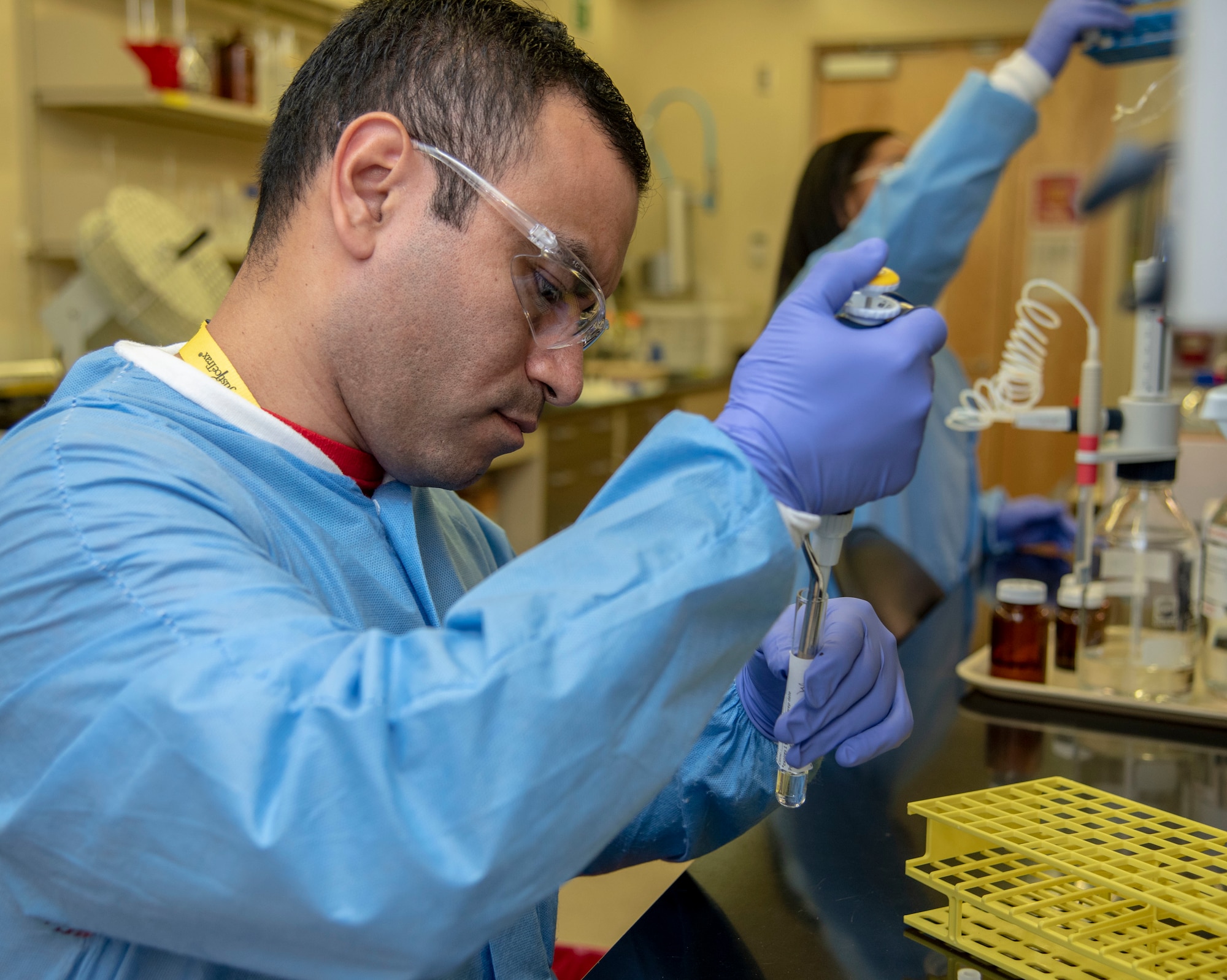 David Barajas, Armed Forces Medical Examiner System analytical toxicologist 2, pipettes liquid to reconstitute a substance from the turbovap October 31, 2019 at the AFMES Forensic Toxicology lab. Once reconstituted, the specimen is tested using Liquid Chromatography Tandem Mass Spectrometry, where any synthetic cannabinoids, fentanyl or norfentanyl are separated out and identified. (U.S. Air Force photo by Staff Sgt. Nicole Leidholm)