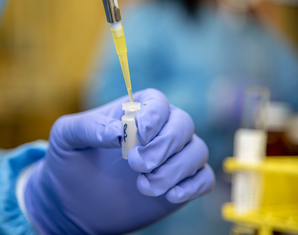 David Barajas, Armed Forces Medical Examiner System Forensic Toxicology analytical toxicologist 2, prepares a vial for testing October 31, 2019 at the AFMES Forensic Toxicology lab. The lab confirms fentanyl and its metabolite, norfentanyl, as well as synthetic cannabinoids, commonly called Spice and K2, for the DDRP labs. (U.S. Air Force photo by Staff Sgt. Nicole Leidholm)
