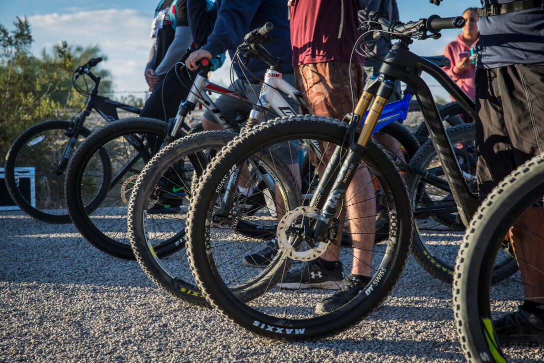 Competitors in the 2nd Annual Telegraph Pass Challenge prepare to start the 5 mile bike portion of the race in Yuma, Ariz., Nov. 2, 2019. The challenge, coordinated by Marine Corps Community Services (MCCS), offered participants the opportunity to compete for first, second, or third place in either a 5 mile run, 5 mile bike route, or both. (U.S. Marine Corps photo by Sgt. Isaac D. Martinez)