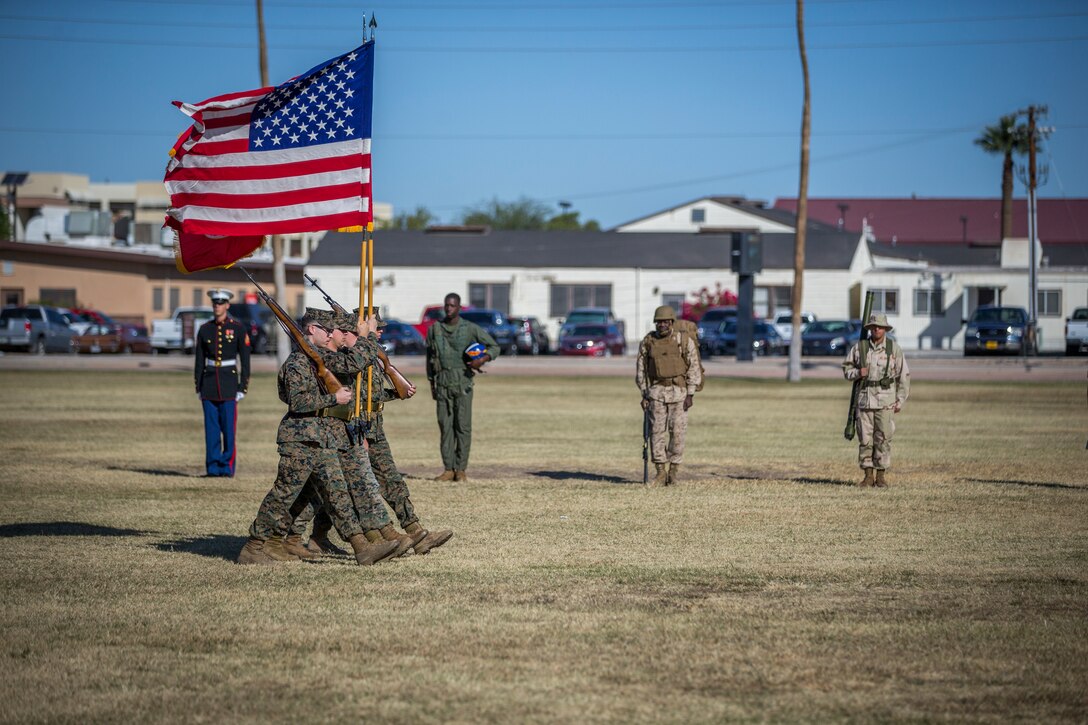 U.S. Marines with Headquarters and Headquarters Squadron, Marine Corps Air Station (MCAS)Yuma, participate in the 244th Marine Corps birthday uniform pageant at the Parade Deck on MCAS Yuma, Ariz., Nov. 7, 2019. The annual ceremony was held in honor of the 244th Marine Corps birthday, showcasing historical uniforms to honor Marines of the past, present and future while signifying the passing of traditions from one generation to the next. (U.S. Marine Corps photo Lance Cpl. John Hall)