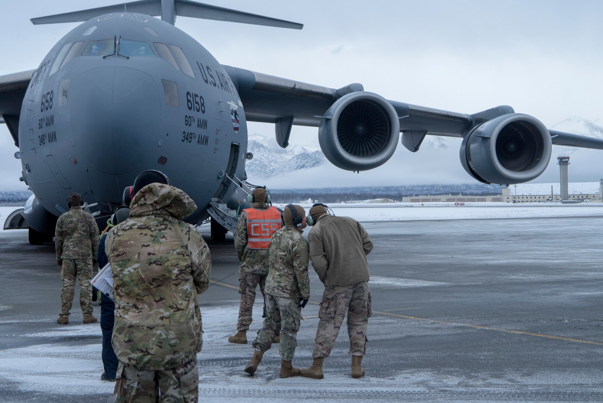 Airmen from Travis Air Force Base, Calif., and Joint Base Elmendorf-Richardson, get ready for cold weather aircraft maintenance procedures training at JBER, Alaska, Nov. 19, 2019. The training prepared Airmen to operate in arctic environments.
