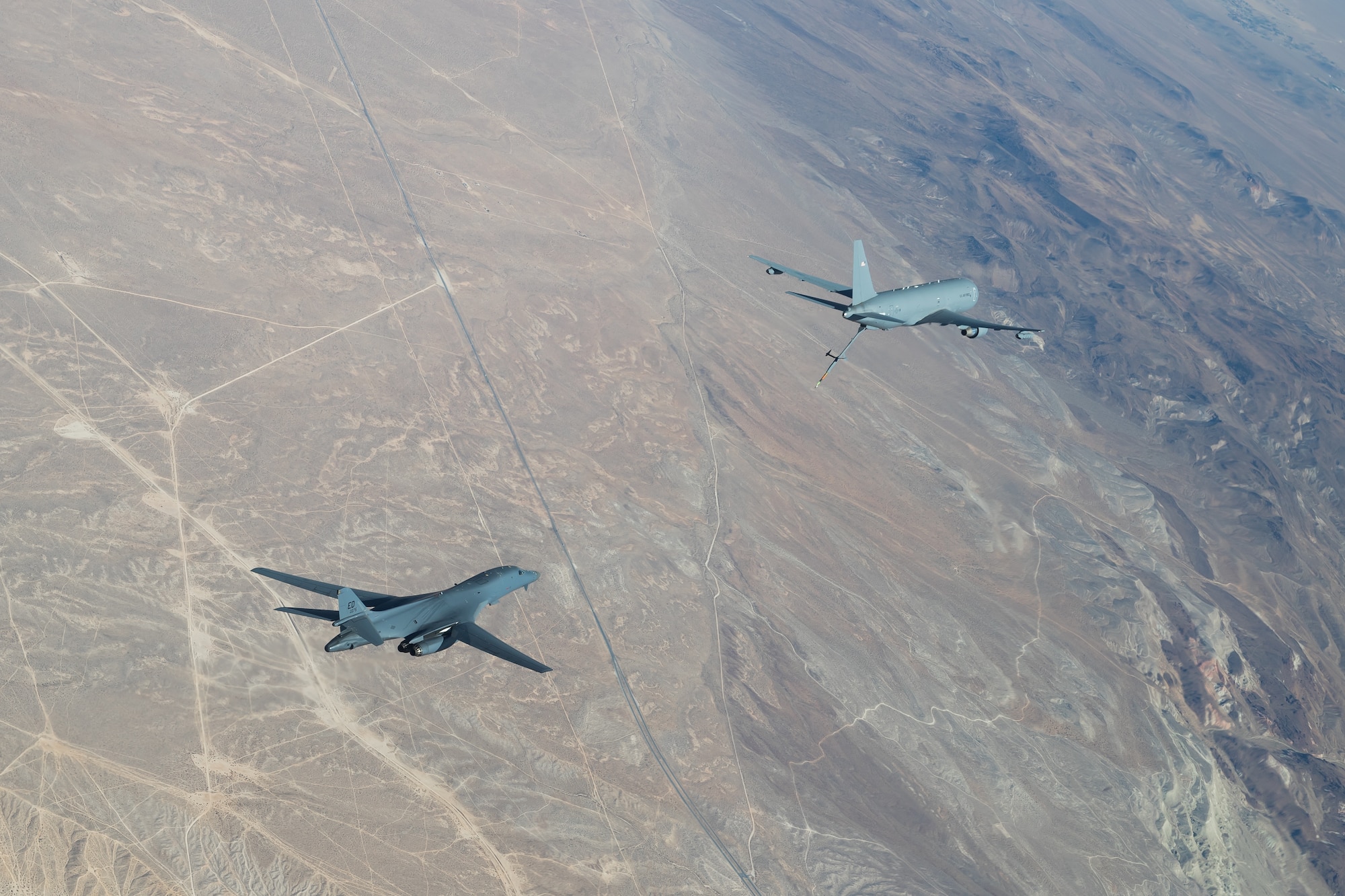 The B-1B Lancer conducted aerial testing with the KC-46 Pegasus in the skies over Edwards Air Force Base, California, recently. (Air Force photo by Don Allen)