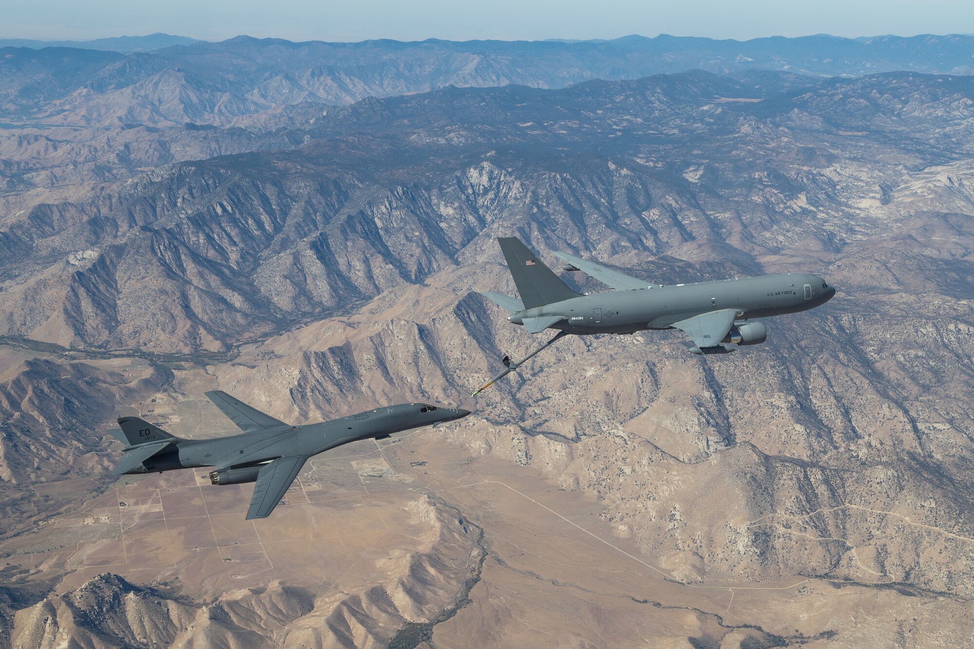 The B-1B Lancer conducted aerial testing with the KC-46 Pegasus in the skies over Edwards Air Force Base, California, recently. (Air Force photo by Don Allen)