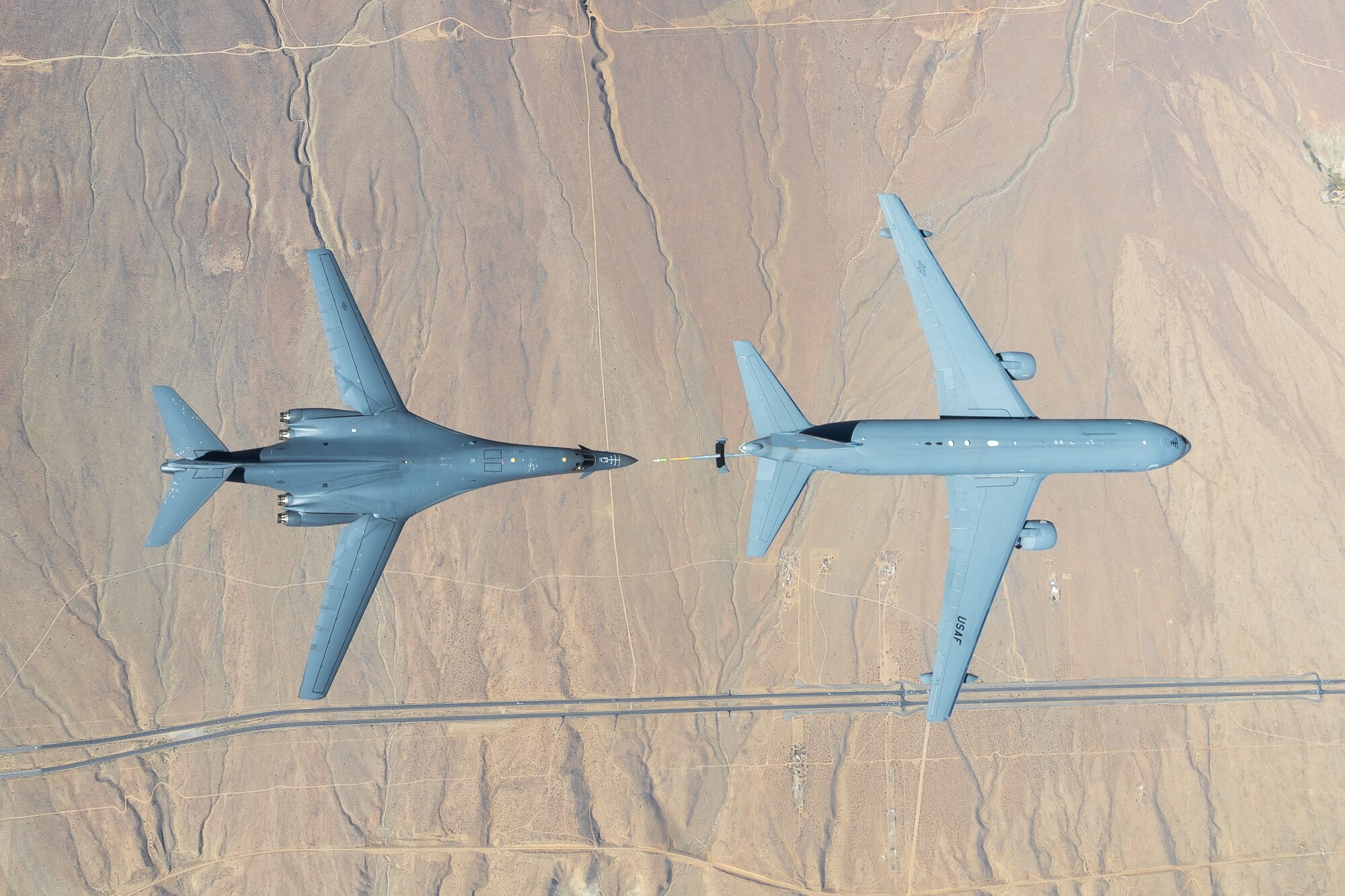 The B-1B Lancer conducted aerial testing with the KC-46 Pegasus in the skies over Edwards Air Force Base, California, recently. (Air Force photo by Don Allen)