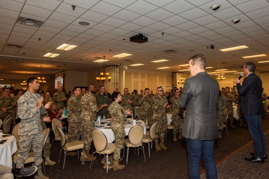 U.S. Airmen and Soldiers stand and applaud the facilitators of the “Brothers at War” Resiliency Workshop at Shaw Air Force Base, South Carolina, Nov. 21, 2019.