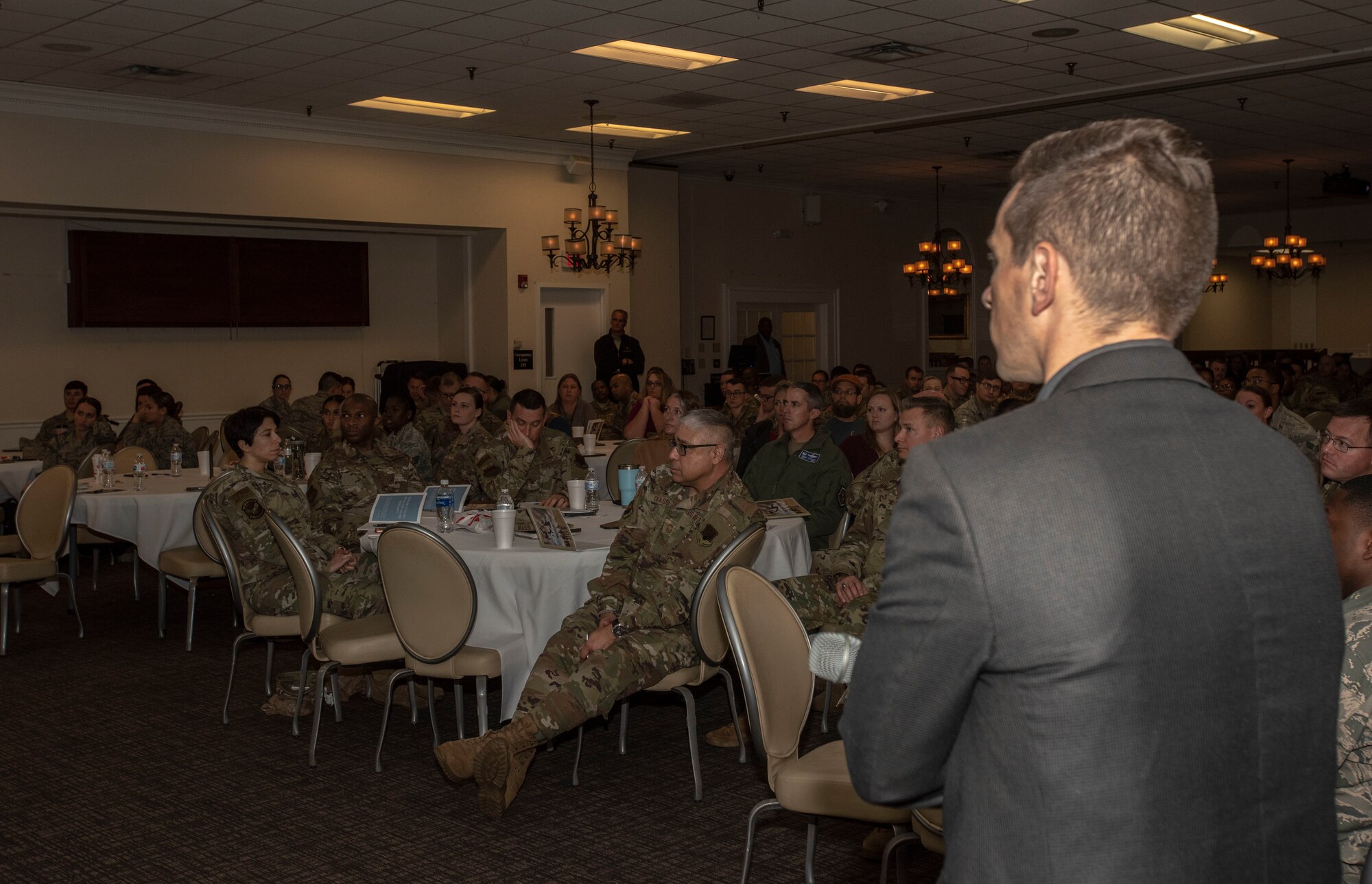 Dr. Nathan Graeser, social worker, looks out over the audience during the “Brothers at War” Resiliency Workshop at Shaw Air Force Base, South Carolina, Nov. 21, 2019.