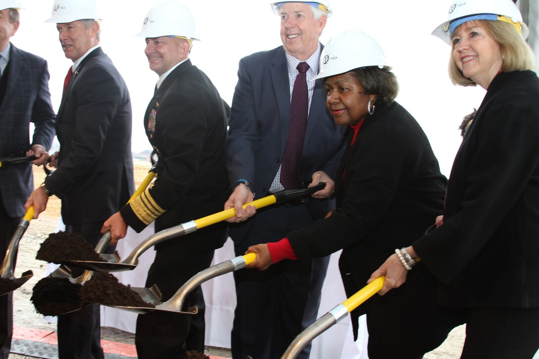 With significant federal, state and local dignitaries present, the National Geospatial-Intelligence Agency with many partners celebrated the symbolic groundbreaking for beginning of construction on the 97-acre campus in North St. Louis November 26, 2019. Left to right - Hon. Joseph Maguire, Acting Director of National Intelligence, Vice Adm. Robert Sharp, Director of the National Geospatial-Intelligence Agency, Missouri Gov. Mike Parson, St. Louis Comptroller Darlene Green, Mayor Lyda Krewson.